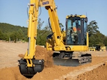 New Komatsu Excavator Working in Dirt